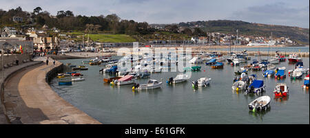 UK England, Dorset, Lyme Regis. boats moored within the Cobb Harbour, panoramic Stock Photo