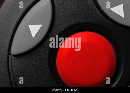 Big red button close-up, type any word on button Stock Photo