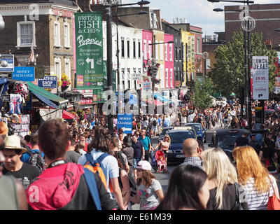 View of crowds of busy shoppers and tourists in Camden High Street London Stock Photo