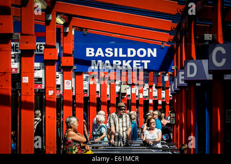 People waiting in Basildon Bus Station. Stock Photo