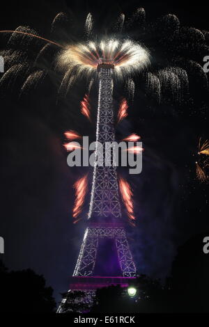 Fireworks launched from the Eiffel Tower in Paris, France for Bastllle Day, AKA 14th July, or Catorze Julliet. Stock Photo