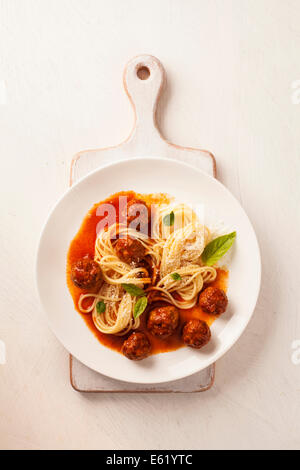 Spaghetti tomato sauce with pork and vegetable in bowl Stock Photo - Alamy
