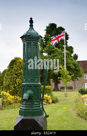 UK England, Dorset, Stalbridge, Victorian Cast Iron water pump on village green Stock Photo
