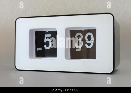 A close up shot of a flip clock Stock Photo