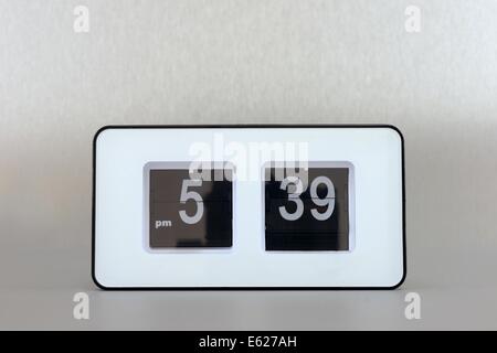 A close up shot of a flip clock Stock Photo