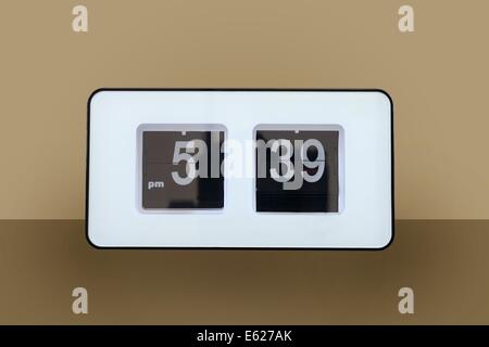A close up shot of a flip clock Stock Photo