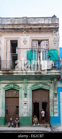 Cubans in old apartment building Old Havana, Cuba Stock Photo