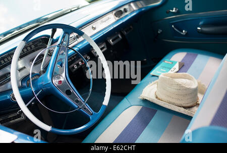1957 Chevrolet, Bel Air interior with straw hat. Chevy. Classic American car Stock Photo