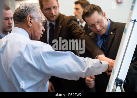 NASA Administrator Charles Bolden speaks with young professionals about their project on New England water resources during the