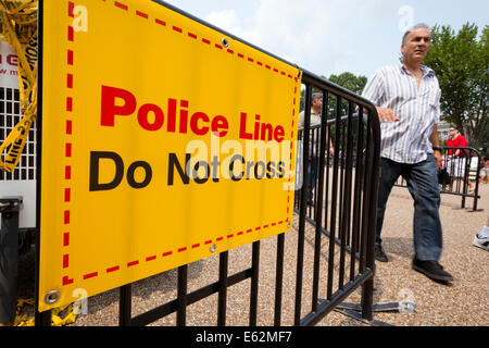 Police line sign on barricade fence - Washington, DC USA Stock Photo ...