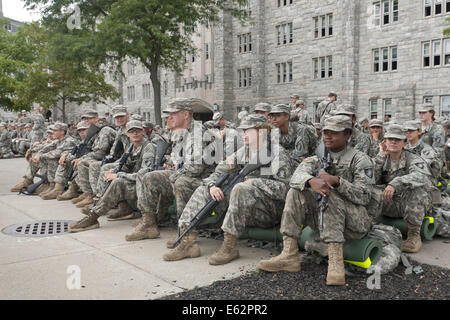 West Point, New York, USA. 12th Aug, 2014. New cadets rest after marching back from Beast Barracks at Camp Buckner to the United States Military Academy at West Point, New York. The 12-mile march back to West Point marked the end of Cadet Basic Training for the Class of 2018. Credit:  Tom Bushey/ZUMA Wire/Alamy Live News Stock Photo