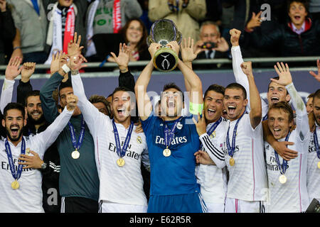 Cardiff, Wales. 12th Aug, 2014. UEFA Super Cup. Real Madrid CF v Sevilla FC. Real Madrid's goalkeeper Iker CASILLAS lifts the winners trophy Credit:  Action Plus Sports/Alamy Live News Stock Photo