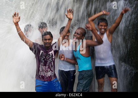 Youth friends of Tamil Nadu India Enjoying bathing at Hogenakkal water falls Stock Photo