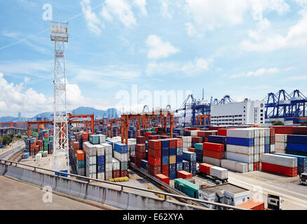 Port warehouse with containers and industrial cargoes at day Stock Photo