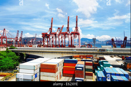 Port warehouse with containers and industrial cargoes at day Stock Photo