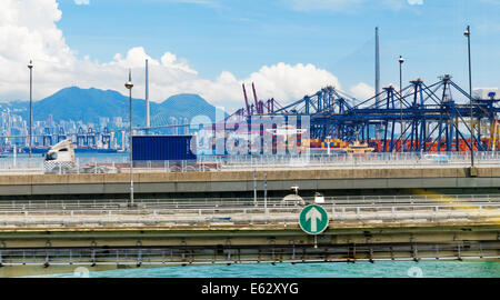 Port warehouse with containers and industrial cargoes at day Stock Photo