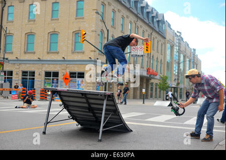 Street artists perform at the Dundas street festival held in London, Ontario in Canada. Stock Photo