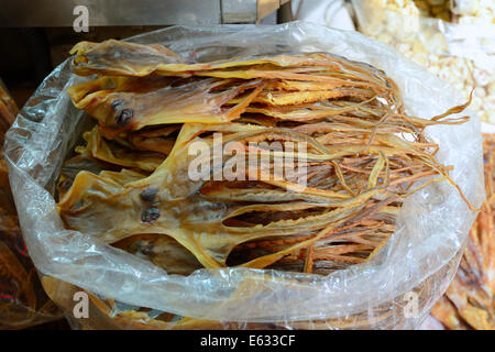Dried cuttlefish, in front of a traditional pharmacy, Kowloon, Hong Kong, China Stock Photo