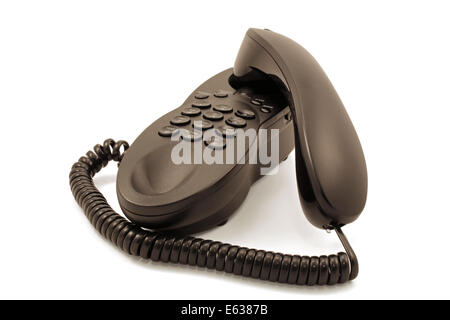 Closeup of a black corded telephone against a white background Stock Photo