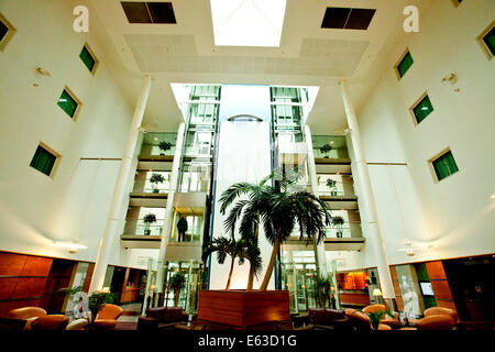 Gatwick Arora International Hotel Lounge with Palm Trees and Water Feature Stock Photo