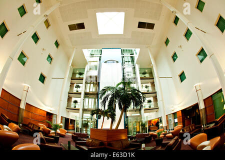 Gatwick Arora International Hotel Lounge with Palm Trees and Water Feature Stock Photo