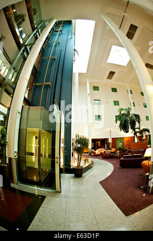 Gatwick Arora International Hotel Glass Elevator and Lounge Stock Photo