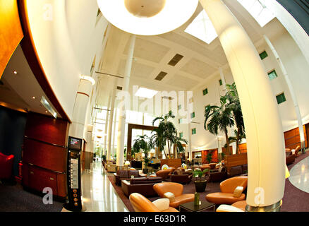 Gatwick Arora International Hotel Lounge with Palm Trees Stock Photo