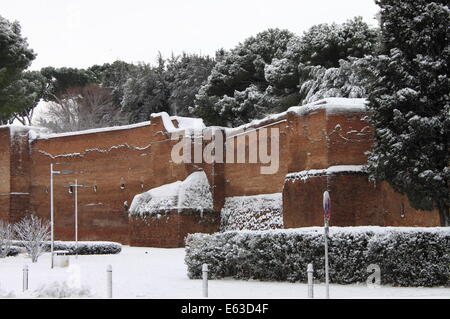 Surrounding walls of Rome under snow in Rome, Italy Stock Photo