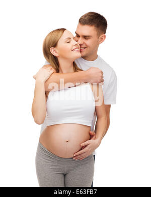 happy young family expecting child Stock Photo