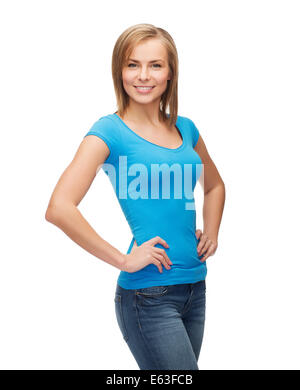 smiling girl in blank blue t-shirt Stock Photo