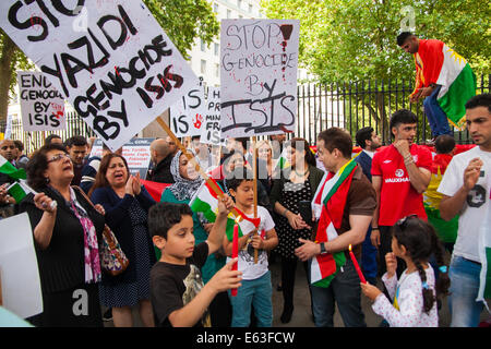 London, August 13th 2014. Dozens of London's Kurdish and Yazidi community demonstrate outside the gates of Downing Street against the unfolding genocide against their people in Iraq by terror organisation ISIS, now known as the 'Islamic State'. Credit:  Paul Davey/Alamy Live News Stock Photo