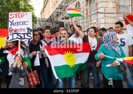 London, August 13th 2014. Dozens of London's Kurdish and Yazidi community demonstrate outside the gates of Downing Street against the unfolding genocide against their people in Iraq by terror organisation ISIS, now known as the 'Islamic State'. Credit:  Paul Davey/Alamy Live News Stock Photo