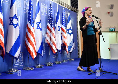 Rakhel Frenkel, whose 16-year-old, dual-national son, Naftali, was one of three boys kidnapped and killed allegedly by Palestinians, addresses reporters from an Israeli Defense Force facility in Tel Aviv, Israel, on July 23, 2014, as U.S. Secretary of Sta Stock Photo