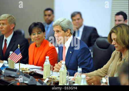 U.S. Secretary of State John Kerry thanks Indian Minister of External Affairs Sushma Swaraj and the Indian delegation for their hospitality during the plenary session of a Strategic Dialogue between the two countries in New Delhi, India, on July 31, 2014. Stock Photo