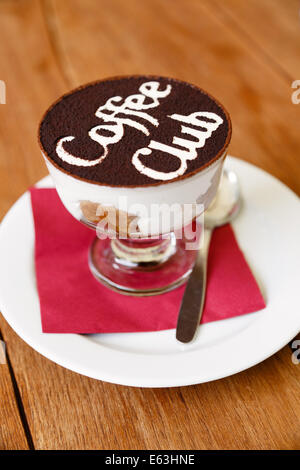 Tiramisu in glass with Coffee Club sign Stock Photo