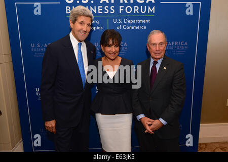 U.S. Secretary of State John Kerry poses for a photo with U.S. Secretary of Commerce Penny Pritzker and UN Special Envoy for Cities and Climate Change and CEO of Bloomberg LP Mike Bloomberg before delivering remarks at the U.S-Africa Business Forum Leader Stock Photo