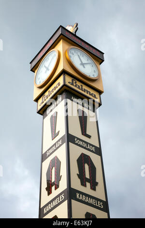 Riga, Latvia - Laima clock tower in Old Town of Riga marks the central meeting point in the city Stock Photo