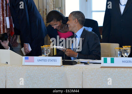 President Barack Obama Shares A Laugh With Sports Writer And Novelist 