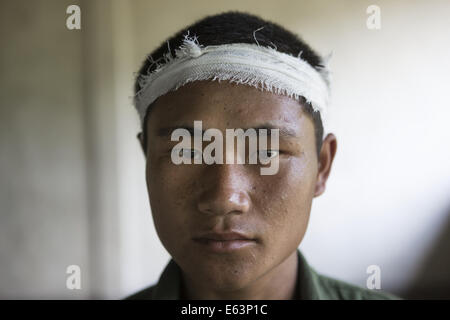 Laiza, Kachin, Myanmar. 8th July, 2014. A KIA recruit at a training camp. (Credit Image: © Taylor Weidman/zReportage.com via ZUMA Press) Stock Photo