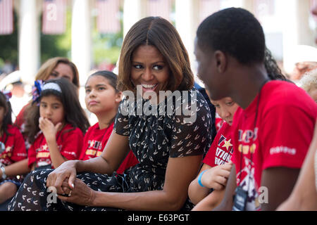 First Lady Michelle Obama attends a Memorial Day ceremony with Tragedy Assistance Program for Survivors (TAPS) families at Arlington National Cemetery in Arlington, Va., May 26, 2014. Stock Photo