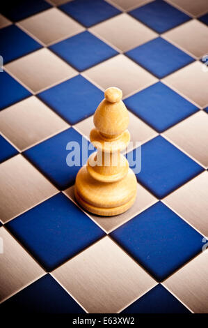 Bishop chess piece on a chessboard Stock Photo