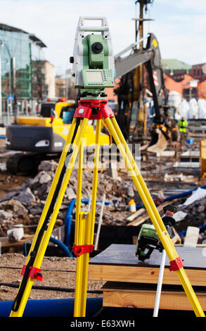 surveyors measuring instrument inside construction plant Stock Photo