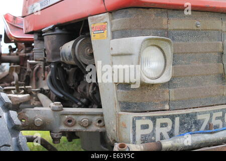 This image is a Massey Ferguson tractor close up. Stock Photo