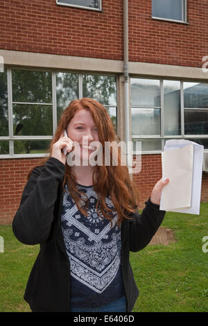 Bromley Kent, UK. 14th Aug, 2014. Student Aine Greene from Bromley High School phones about her A Level results. Credit:  Keith Larby/Alamy Live News Stock Photo