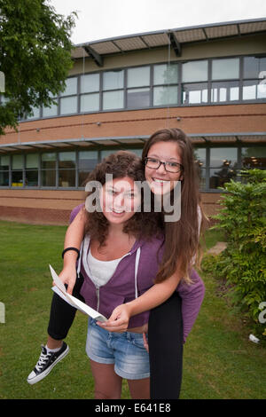 Bromley Kent, UK. 14th Aug, 2014. Students Alex Chrysosthnou and Olwen Mair from Bromley High School celebrate  their A Level results. Credit:  Keith Larby/Alamy Live News Stock Photo