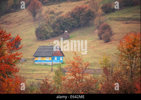 alone house in autumn mountain Stock Photo