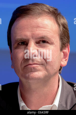 Rio de Janeiro, Brazil. 5th Aug, 2014. The mayor of Rio de Janeiro, Eduardo Paes, attends a conference in Rio de Janeiro, Brazil, 5 August 2014. The 2016 summer olympics are going to be carried out in Rio de Janeiro. Photo: Michael Kappeler/dpa/Alamy Live News Stock Photo