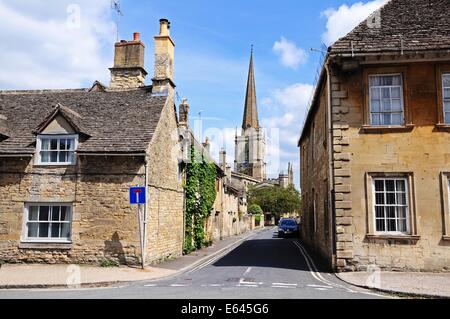 St John the Baptist church seen from the High Street, Burford, Oxfordshire, England, UK, Western Europe. Stock Photo