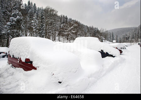 parking in snowfall Stock Photo