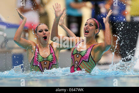 Berlin, Germany. 14th Aug, 2014. Laura Auge and Margaux Chretien of France compete in the Duet-Synchronized Free Routine at the 32nd LEN European Swimming Championships 2014 at the Schwimm- und Sporthalle im Europa-Sportpark (SSE) in Berlin, Germany, 14 August 2014. Photo: Hannibal/dpa/Alamy Live News Stock Photo